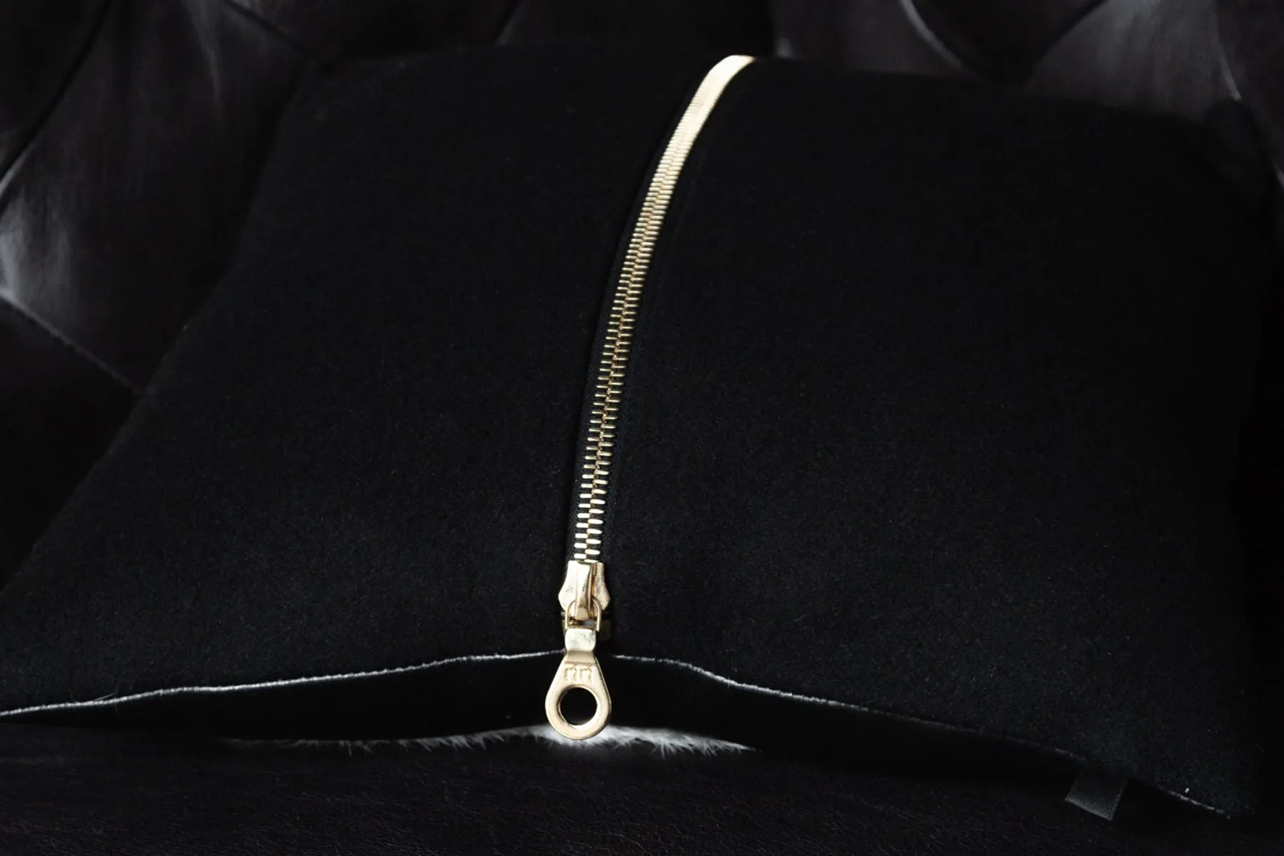 Black shearling harness pillow