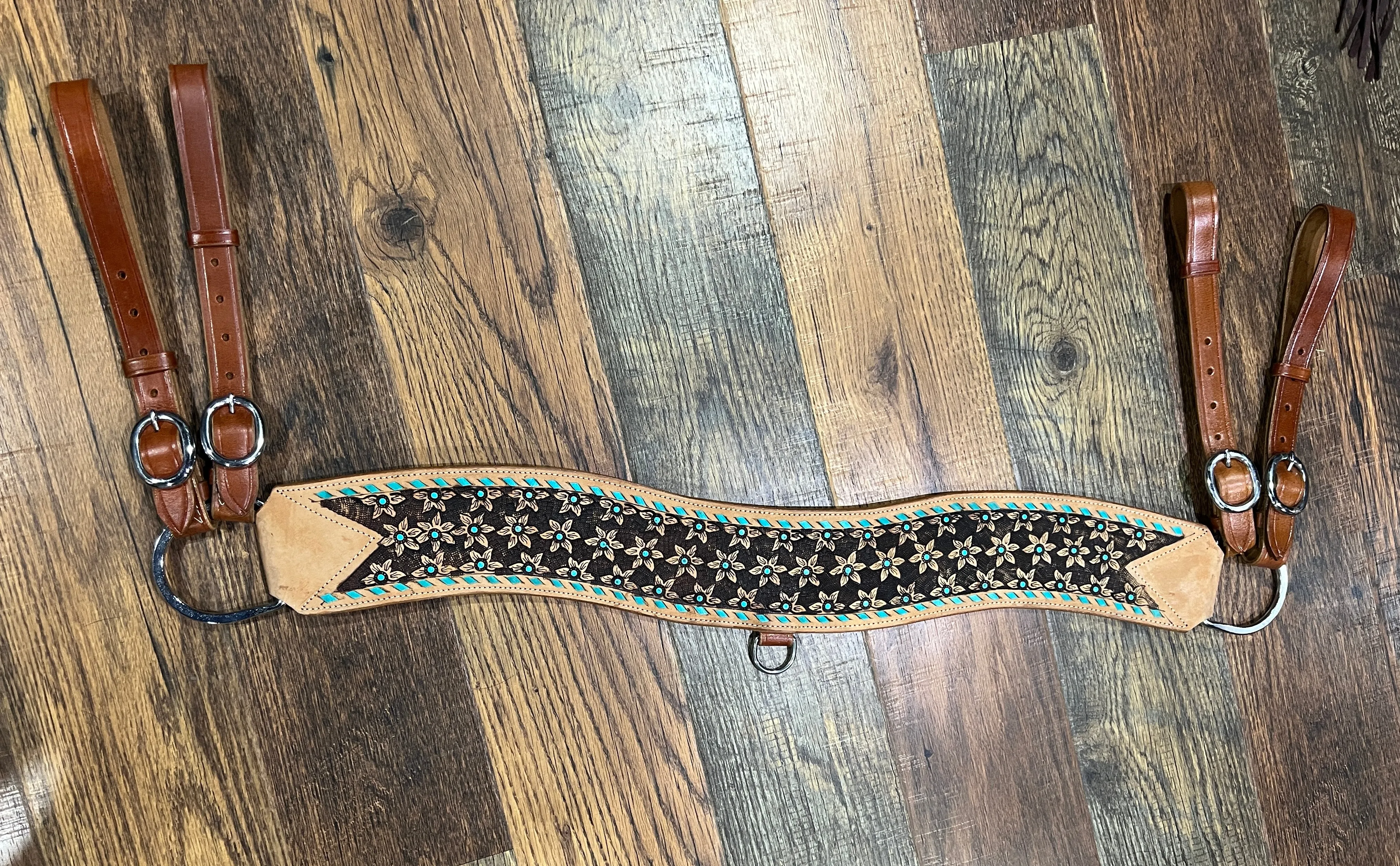 Floral tooled leather tripping collar with teal buckstitch and teal