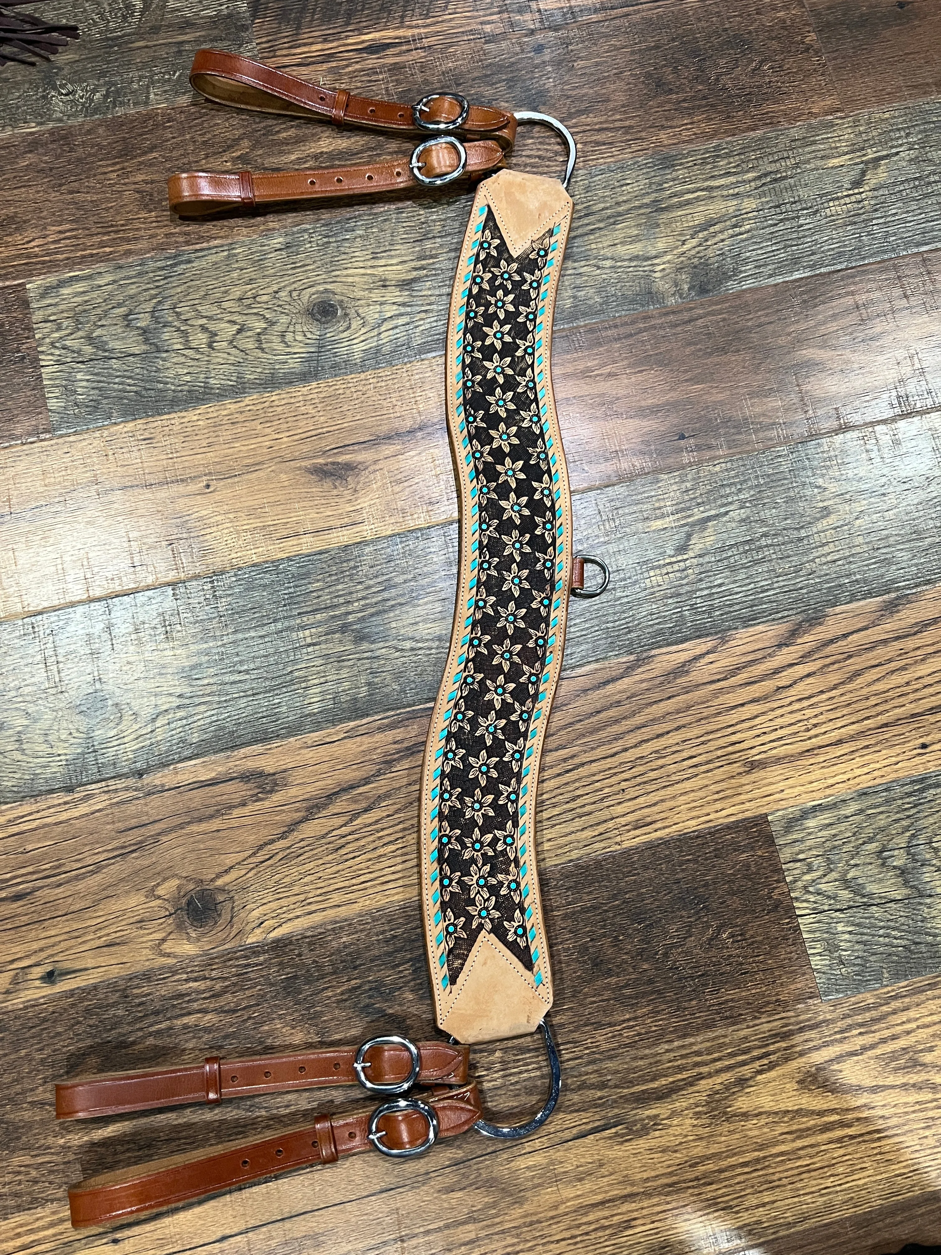 Floral tooled leather tripping collar with teal buckstitch and teal
