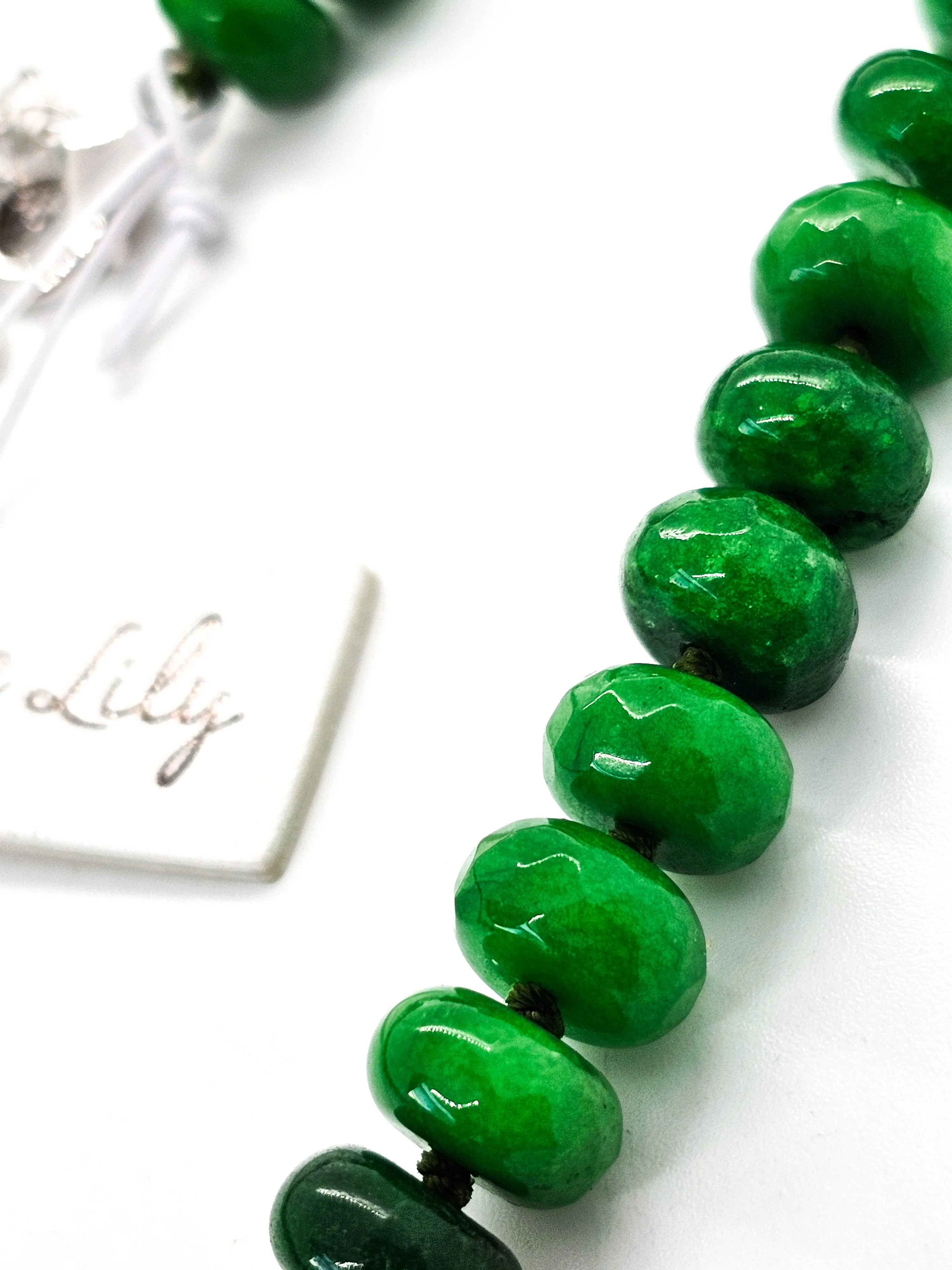 Iris and Lilly Emerald beaded rondelle cut silk strung silver plated necklace