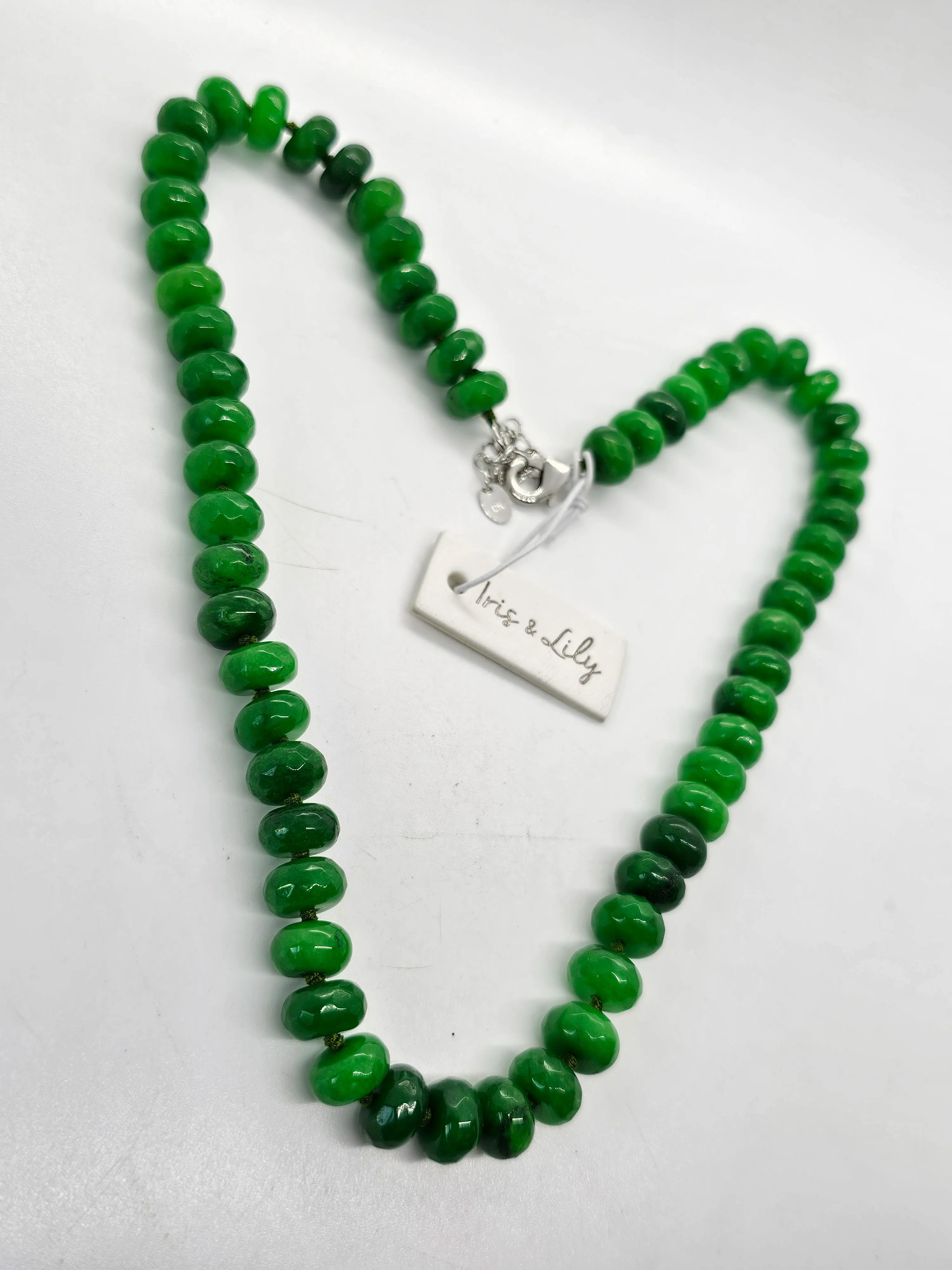 Iris and Lilly Emerald beaded rondelle cut silk strung silver plated necklace
