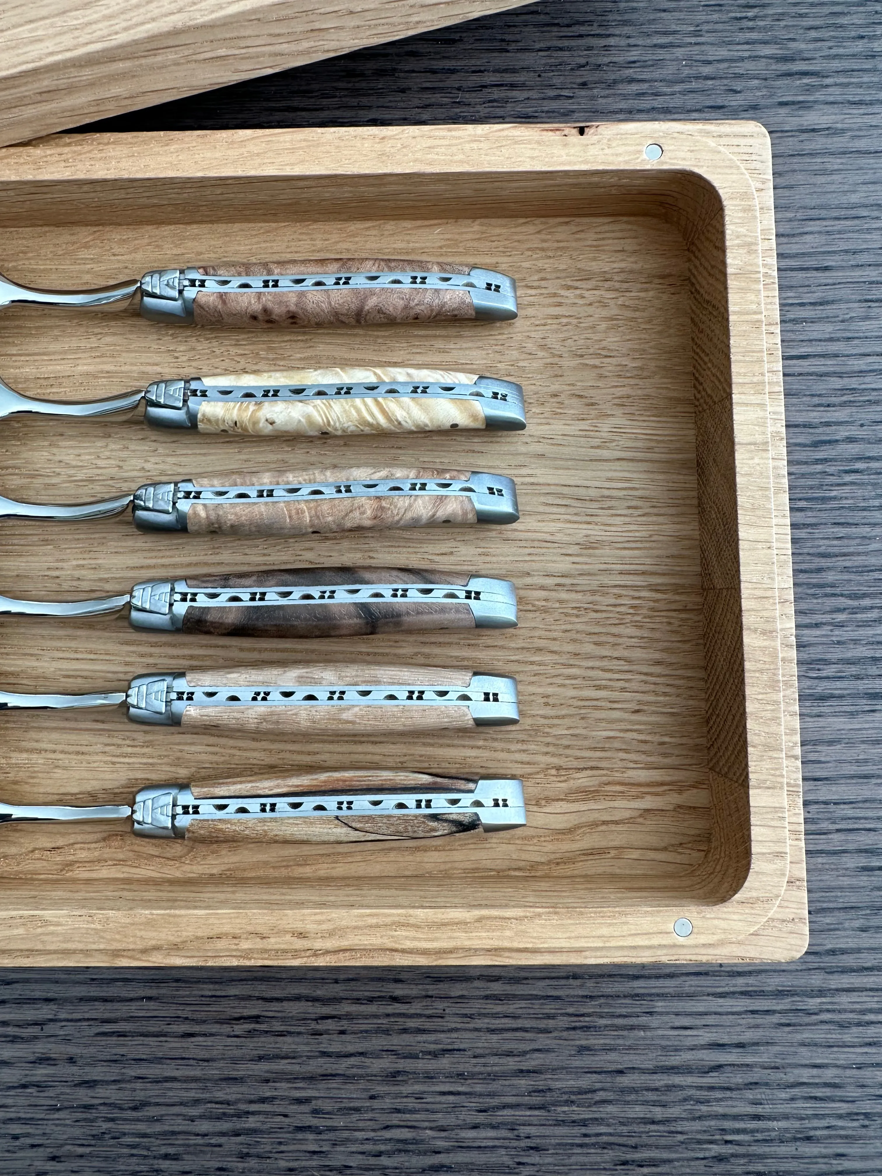 Laguiole en Aubrac Handcrafted 6-Piece Dessert Spoon Set with Mixed European Wood Handles