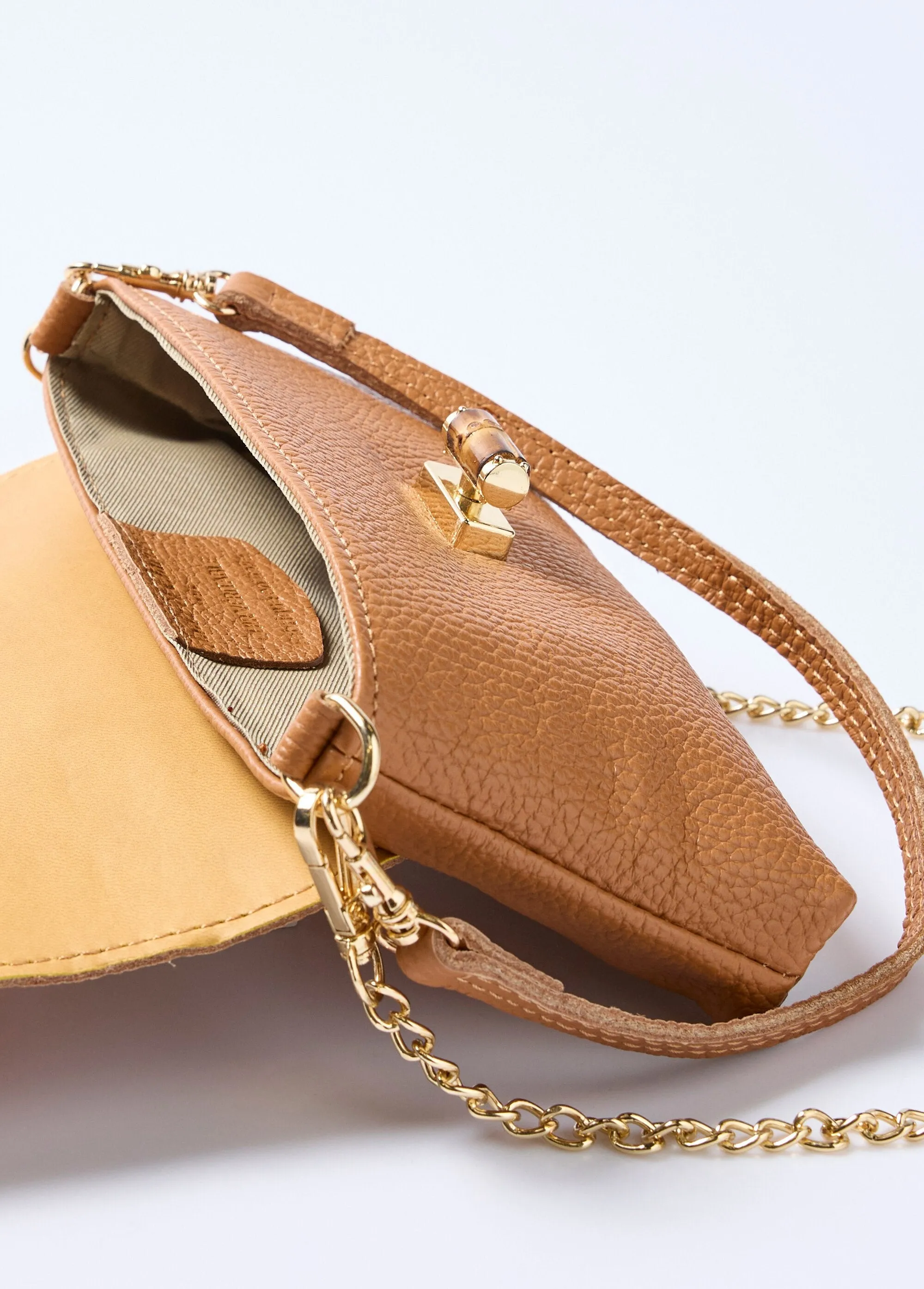 Leather clutch bag with metal clasp
