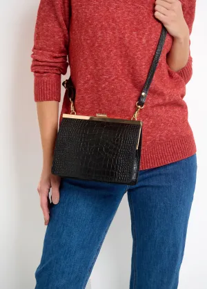 Reptile leather handbag with metal clasp