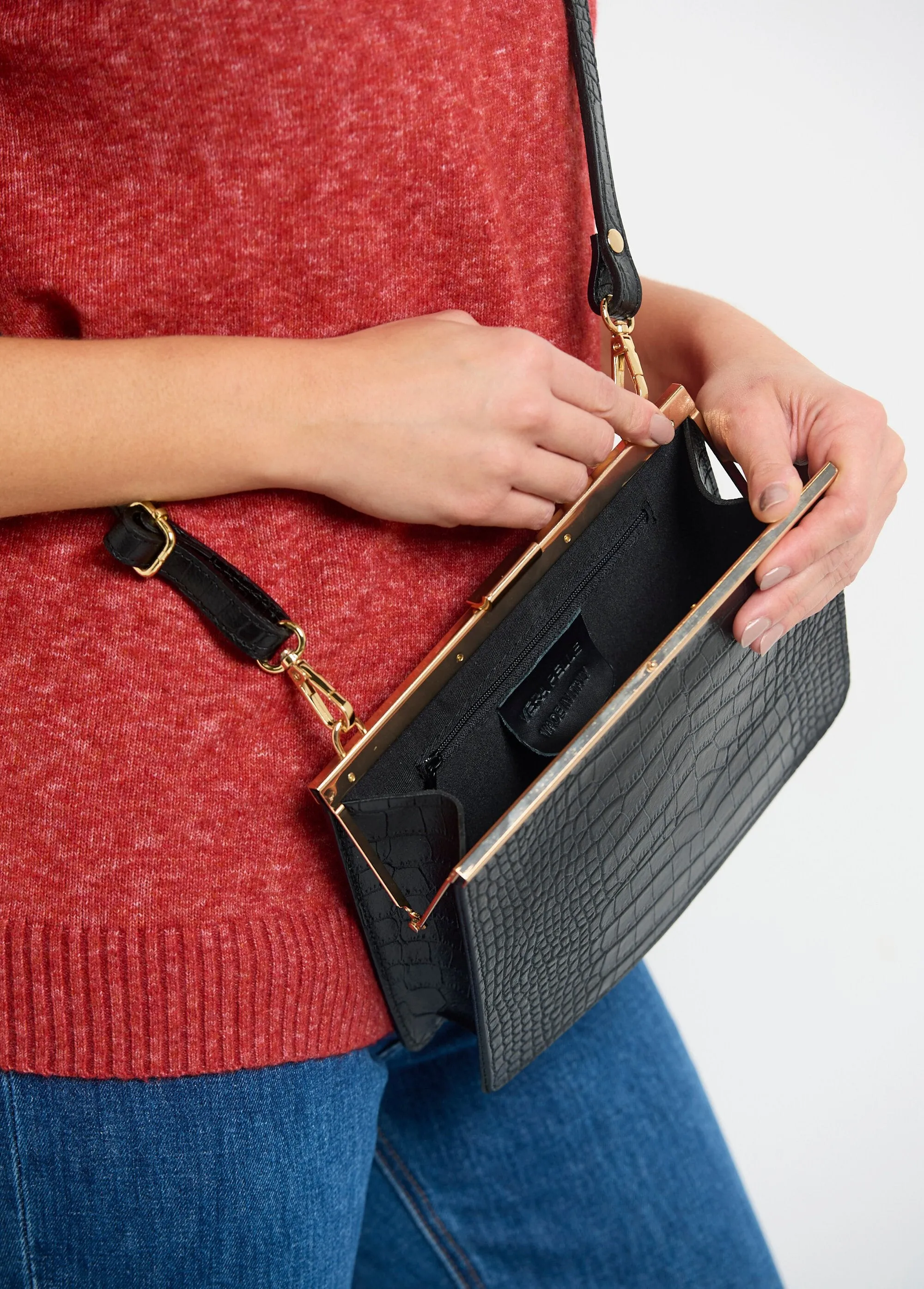 Reptile leather handbag with metal clasp