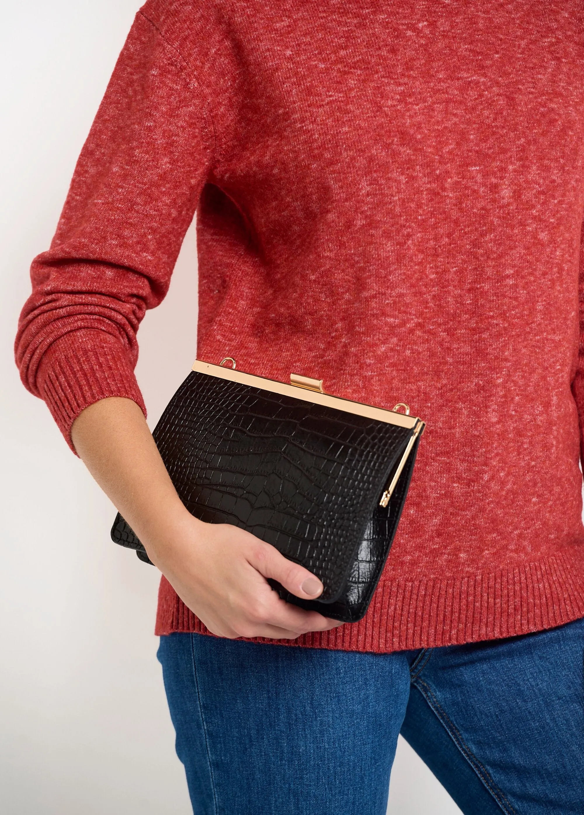Reptile leather handbag with metal clasp