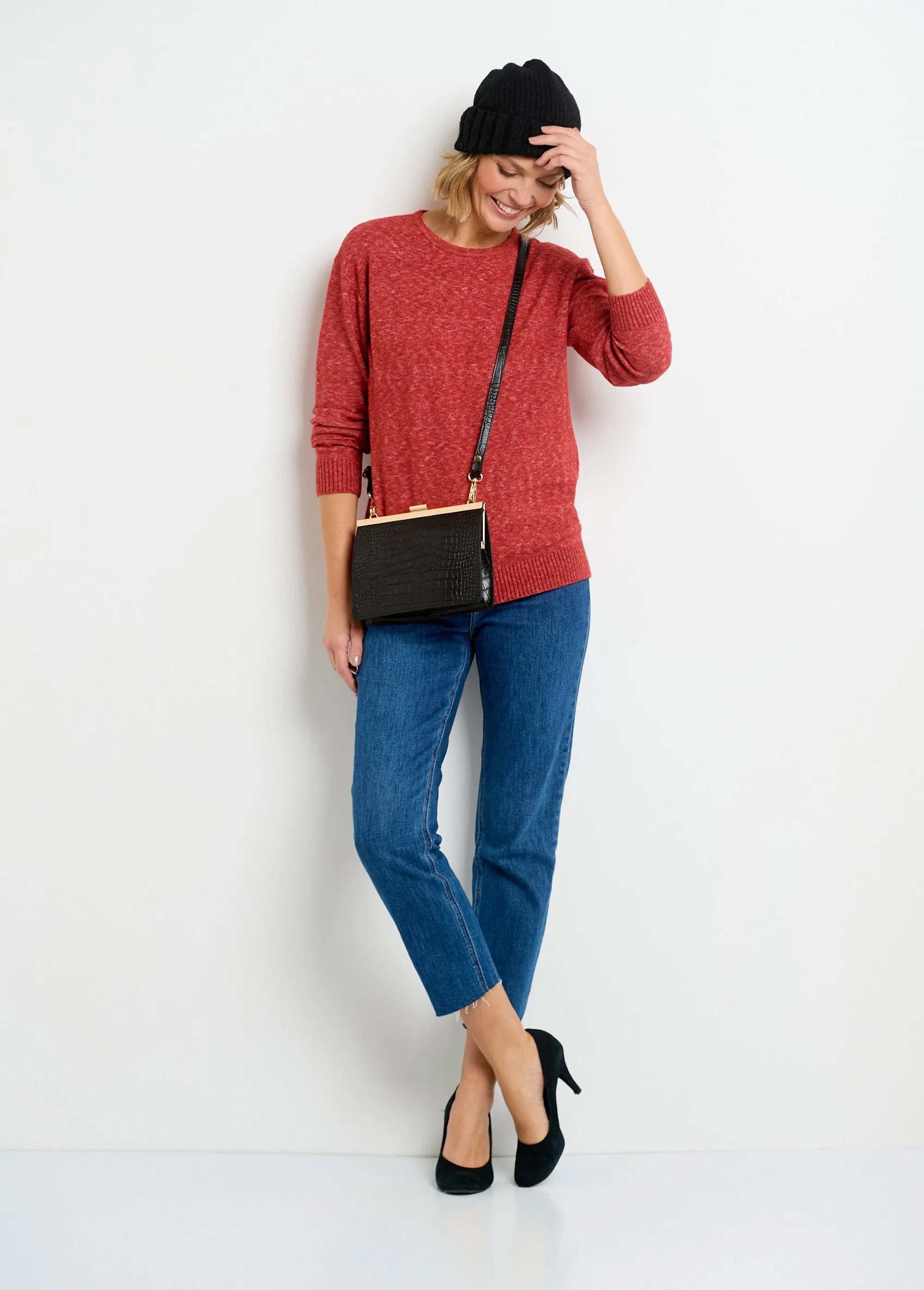 Reptile leather handbag with metal clasp