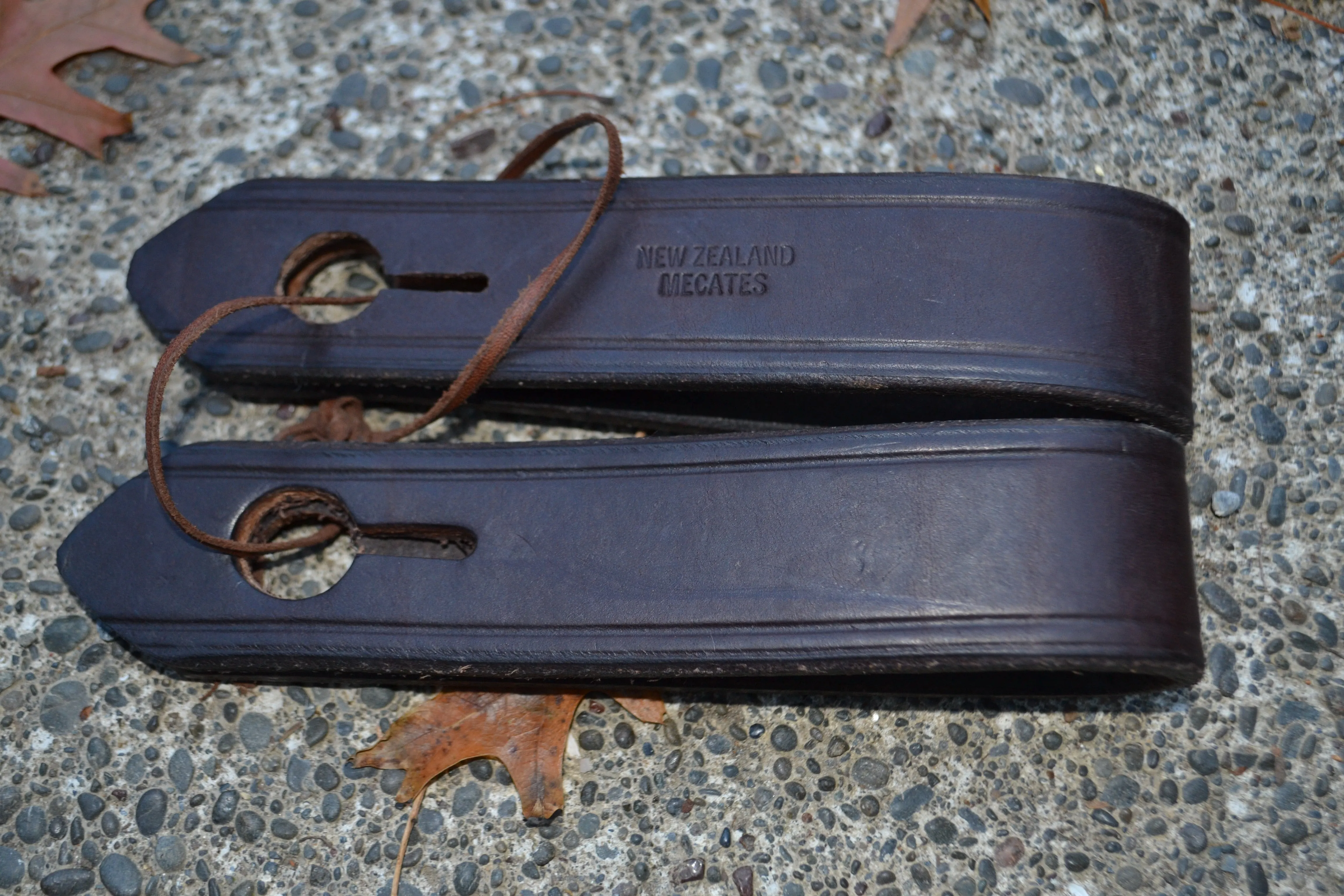 Slobber Straps: Short. Dark brown.