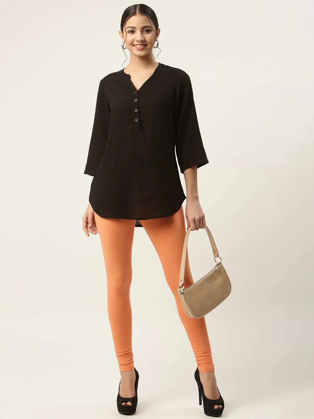 Women Dusty Orange Churidar-Length Leggings